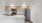 a kitchen with wooden cabinets