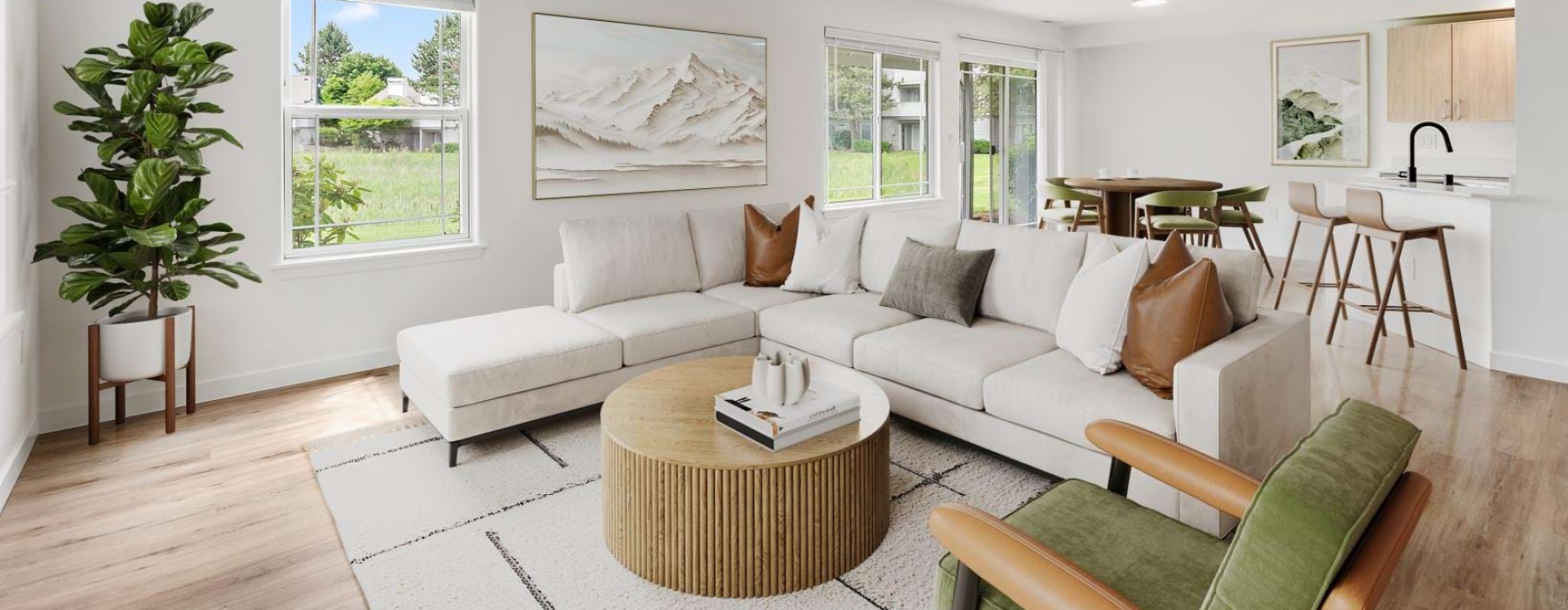 a living room with white furniture