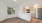a kitchen with a wood floor
