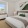 a bedroom with a large window