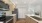 a kitchen with wooden cabinets