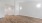 an empty living room with wood floors